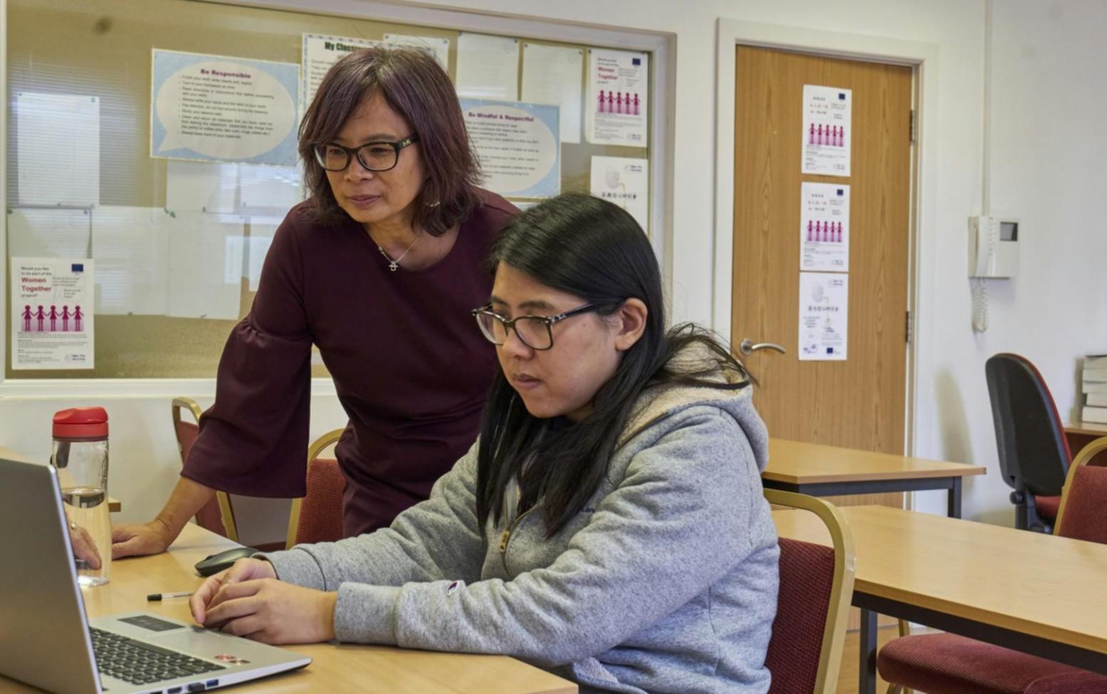 Students collaborating on digital business strategies during intensive workshop session